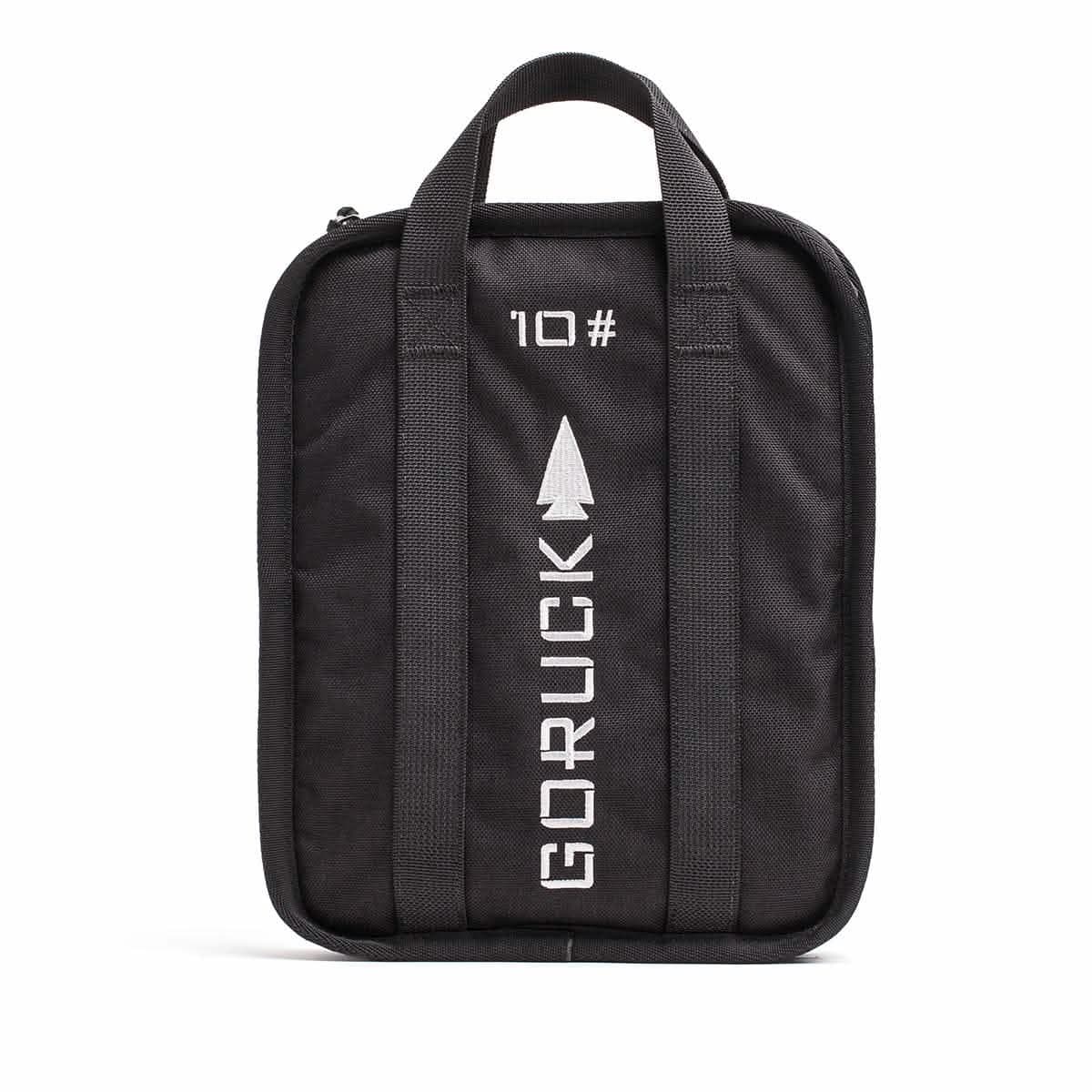 GORUCK Sand Ruck Plate, black fabric pouch with handles and reflective GORUCK logo, studio front view