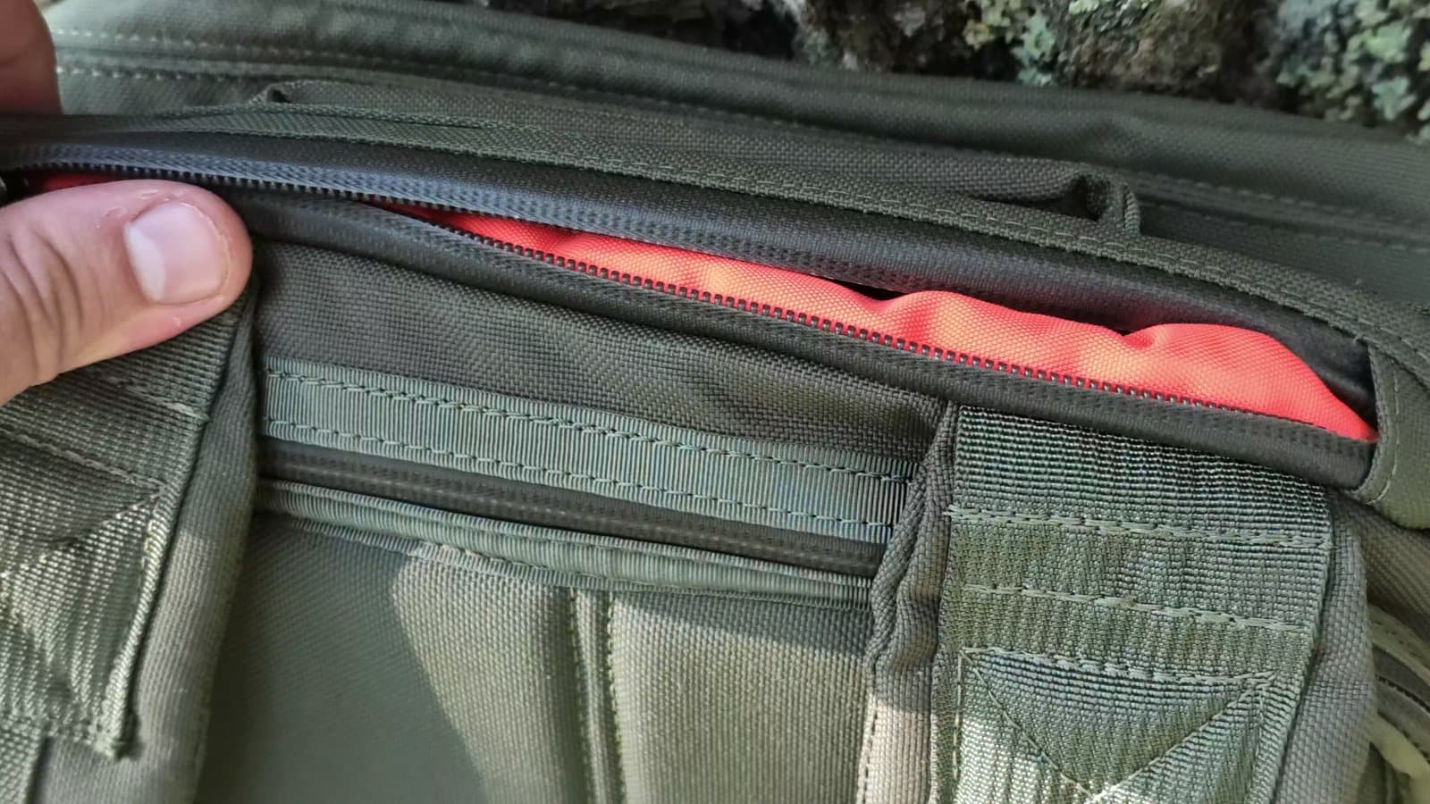 The GR1's red-lined top quick-access pocket unzipped along the top of the bag