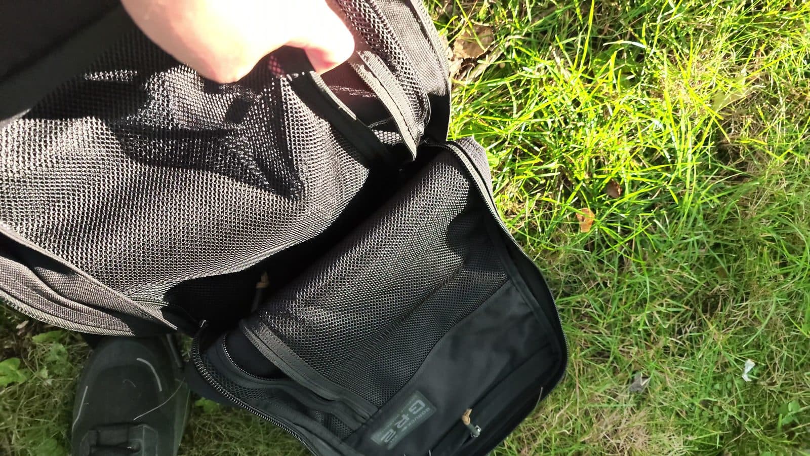 The GR2 front compartment unzipped on the trail