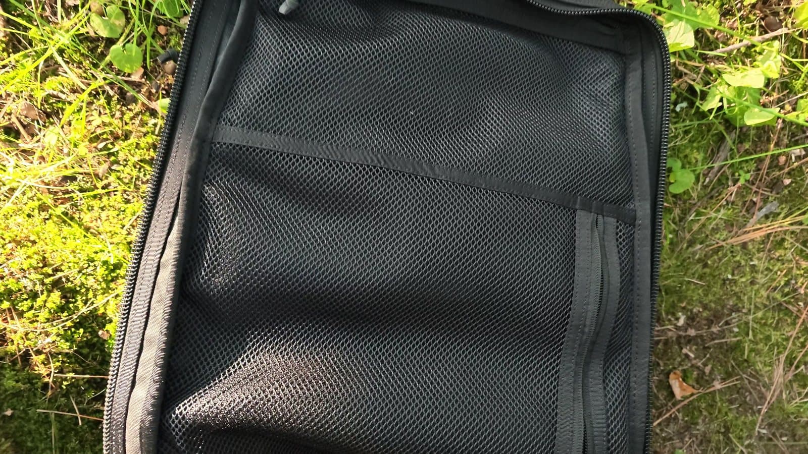 The GR2's main compartment opened flat, showing its mesh zip pockets