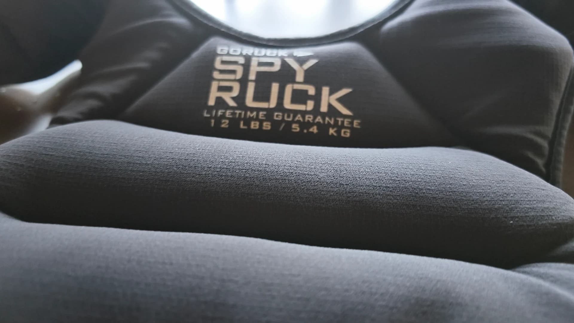 Sewn-in weight sections of Gretchen's black Spy Ruck