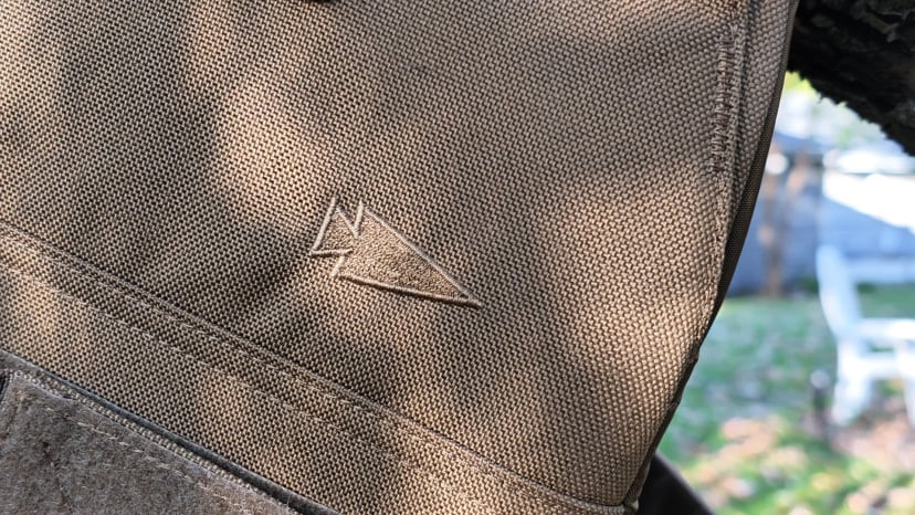 The weave of my vest's 500D exterior and its embroidered GORUCK arrow